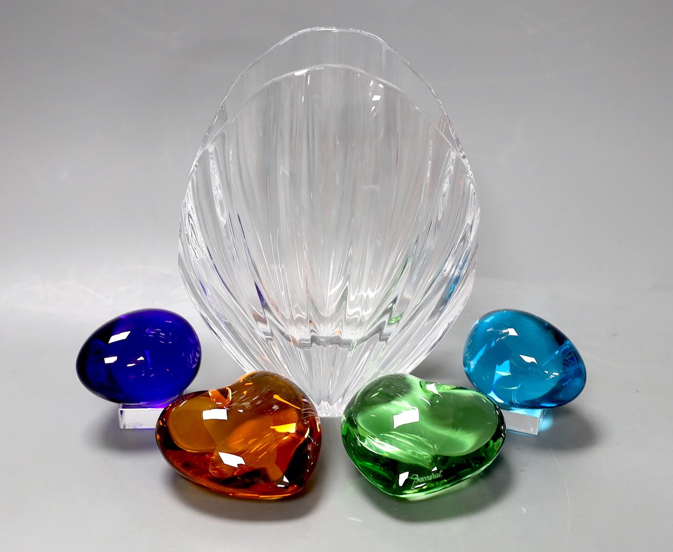 Baccarat - a glass shell shaped vase, 18cm high, two eggs and two hearts